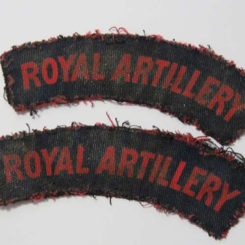 Pair of Royal Artillery cloth shoulder titles
