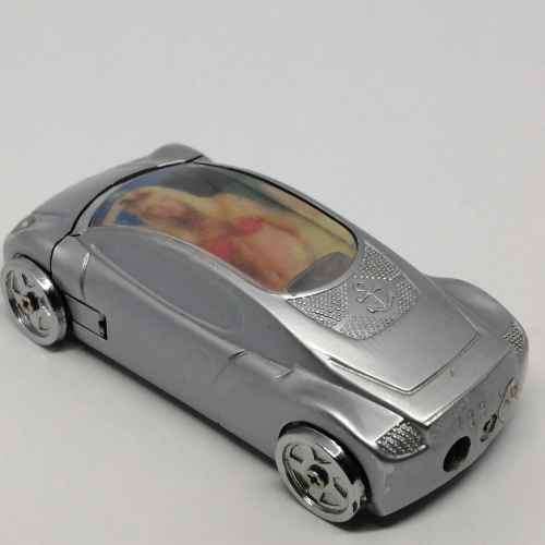 Car shaped pocket lighter with girl in bikini