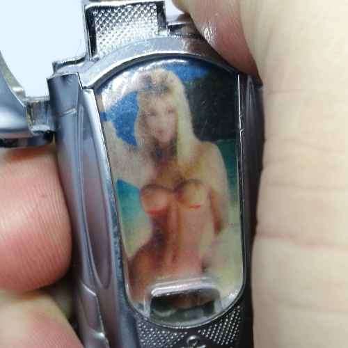 Car shaped pocket lighter with girl in bikini