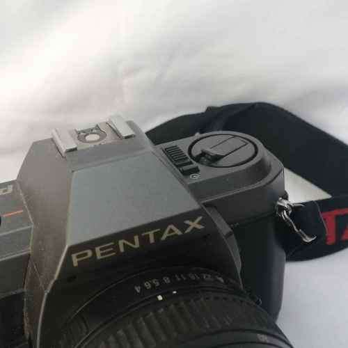 Vintage Pentax P30 T 35mm camera with smc - pentax 1:4-5.6 f = 35-80mm lens