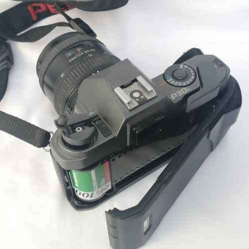 Vintage Pentax P30 T 35mm camera with smc - pentax 1:4-5.6 f = 35-80mm lens