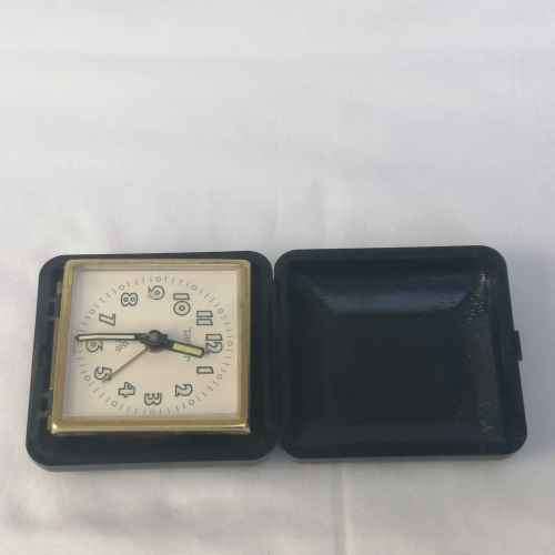 Vintage Peter bedside travelling alarm clock - runs and stops