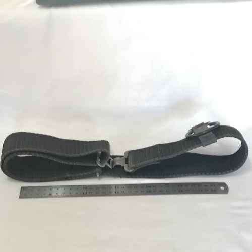 Black material tactical belt with baton holster