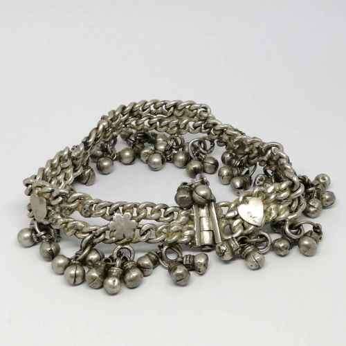 Low Grade silver bracelet with bells - weighs 107.7grams - lenght 23cm - one link broken