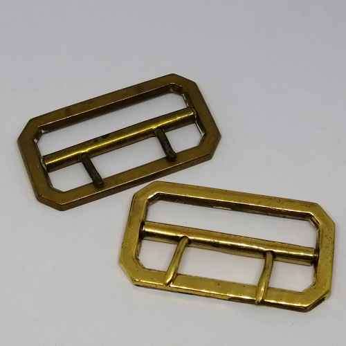 Pair of Police leather belt buckles