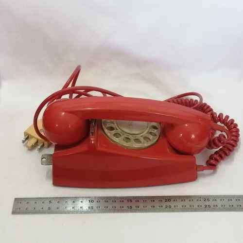 Vintage Red turning dial telephone