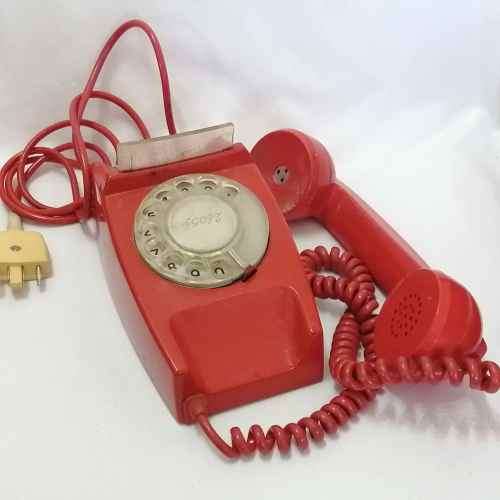 Vintage Red turning dial telephone