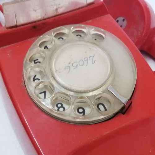 Vintage Red turning dial telephone