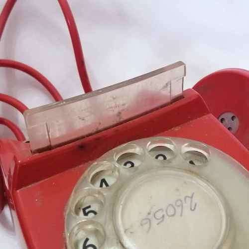 Vintage Red turning dial telephone