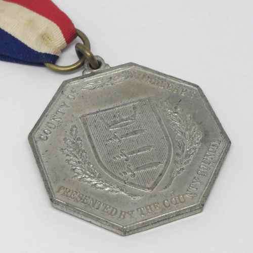 King George V and Queen Mary silver jubilee medal - presented by the Country council of Middlesex