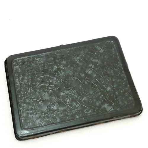 Antique metal case pocket stereo viewer with slides