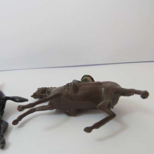 Pair of vintage cavalry troops lead soldiers