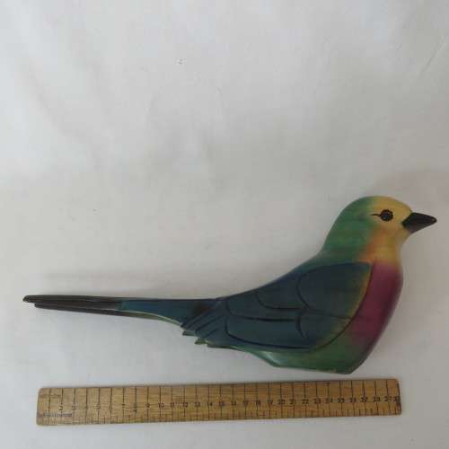 Pair of colorful wooden swallows