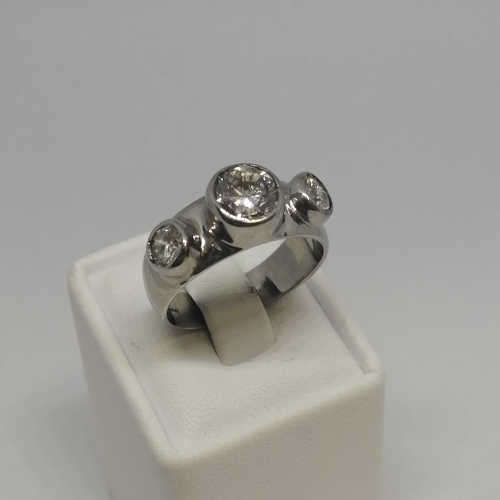 18kt White gold diamond ring with 1.2ct diamond and 2 smaller diamonds of 0.40ct -  weighs 7.0 grams