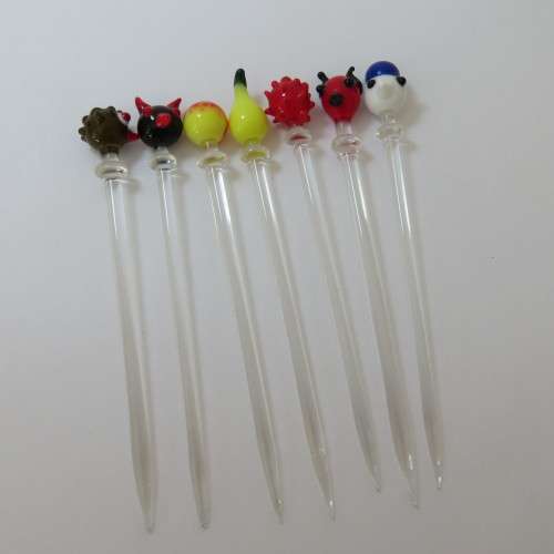 Lot of 7 vintage cocktail sticks of glass in small vase