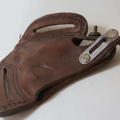 Leather holster for 38 special revolver with 2 inch barrel