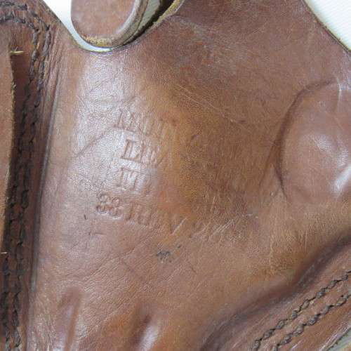 Leather holster for 38 special revolver with 2 inch barrel