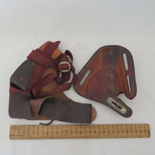 Lot of 10 leather holsters and straps for .32 and .38 revolvers