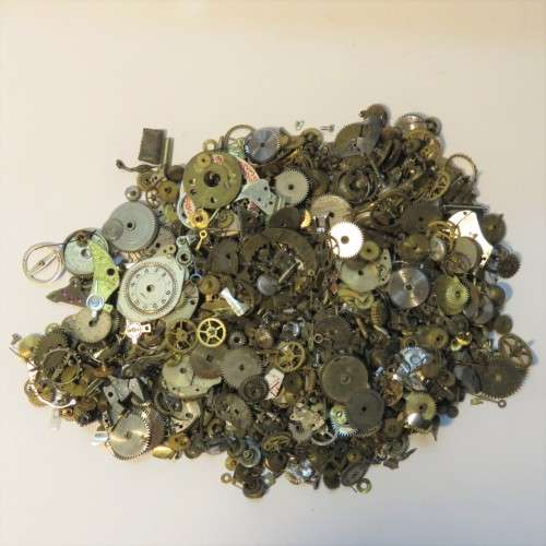 Bag with 100's of watch parts and gears