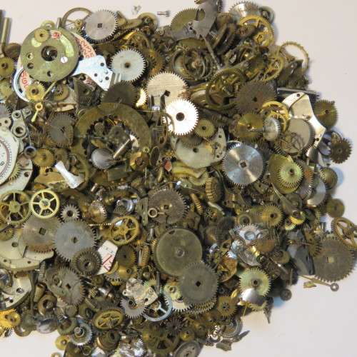 Bag with 100's of watch parts and gears