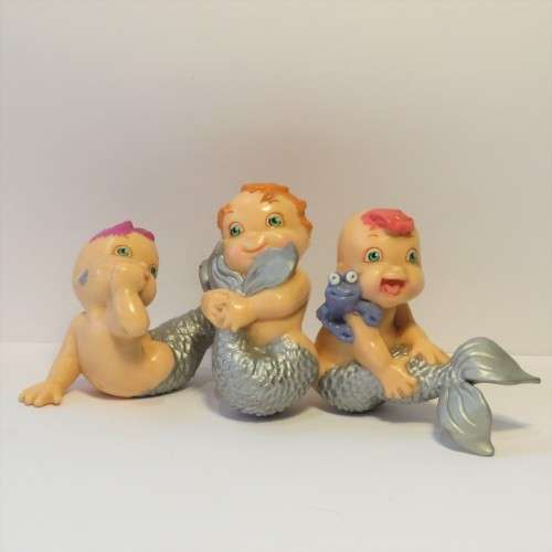 Pair of baby mermaid figurines