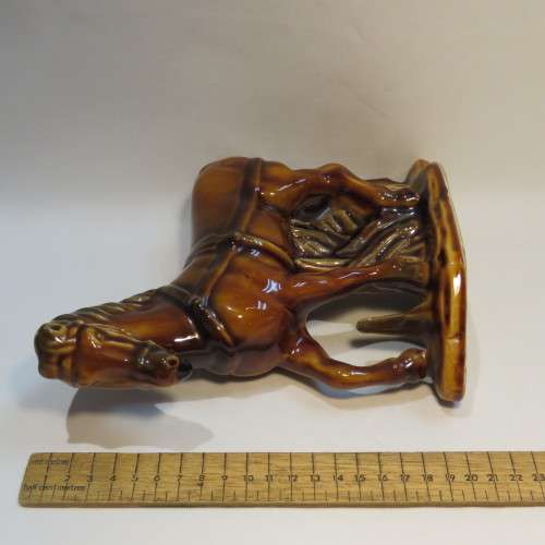 Pair of brown porcelain horses