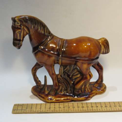 Pair of brown porcelain horses