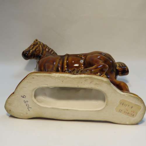 Pair of brown porcelain horses