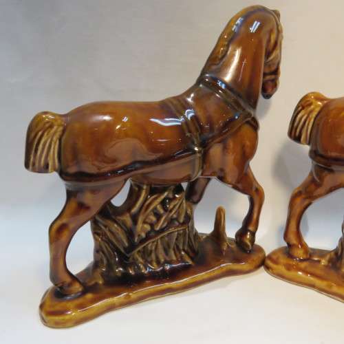 Pair of brown porcelain horses