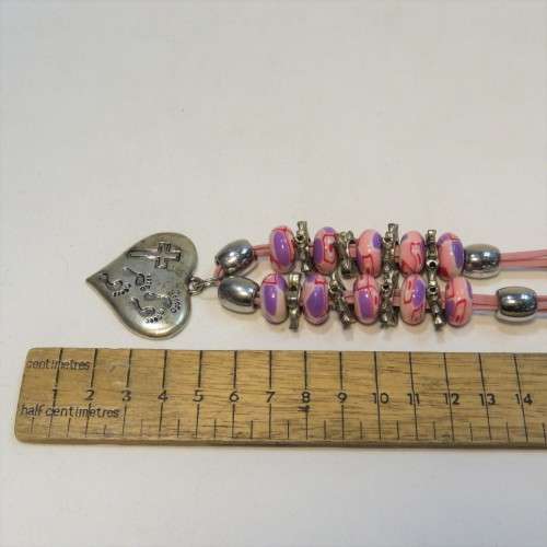 Costume jewellery pink necklace with cross pendant