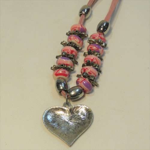 Costume jewellery pink necklace with cross pendant