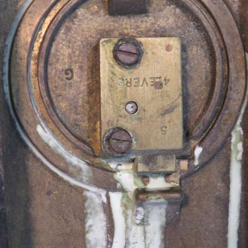 Vintage brass coin operated door lock - Disassembled