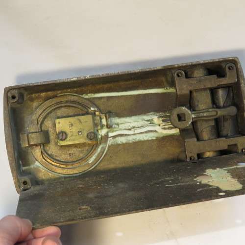 Vintage brass coin operated door lock - Disassembled