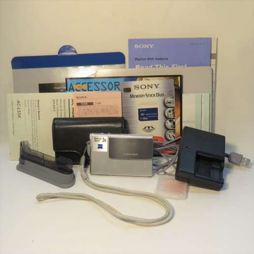Sony DSC 17 digital still camera with books, stand, case, cables and 128 MB memory card
