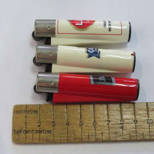 Set of Lion, Castle, Black Label refillable lighters