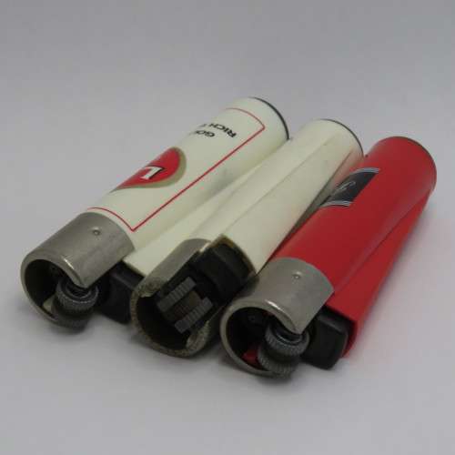 Set of Lion, Castle, Black Label refillable lighters