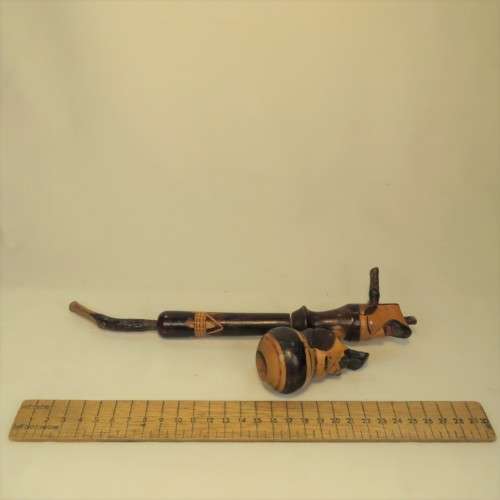 Vintage long stemmed pipe with 2 faces