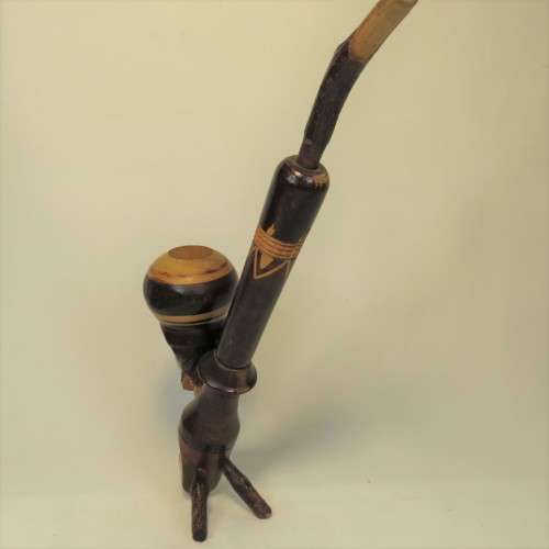 Vintage long stemmed pipe with 2 faces