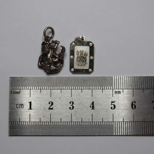 2 Aquarius/Neptune pendants