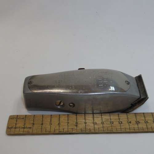 Vintage Andis Master hair clippers with 5 extra sets of blades - Needs power cord