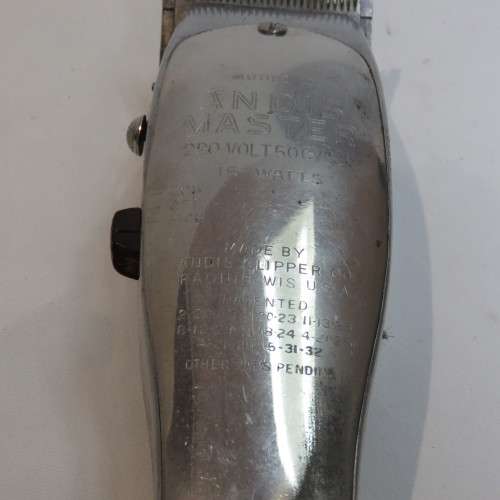 Vintage Andis Master hair clippers with 5 extra sets of blades - Needs power cord
