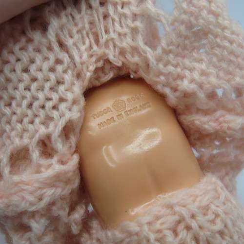 Small Tudor Rose plastic baby doll with closing eyes