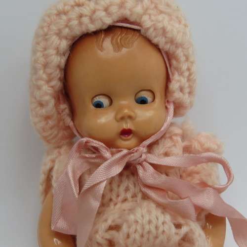 Small Tudor Rose plastic baby doll with closing eyes