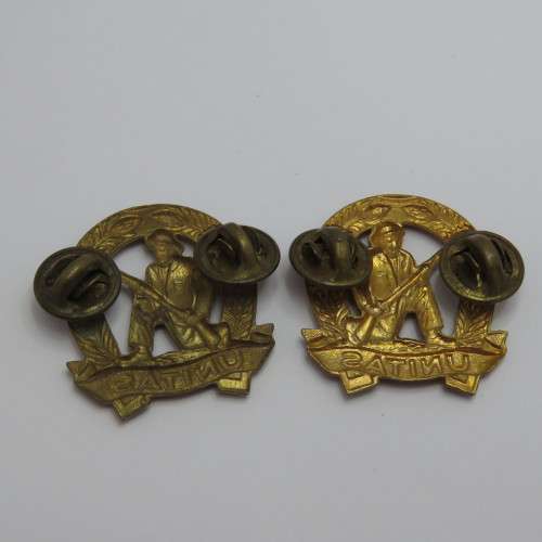 Pair of SADF commando collar badges