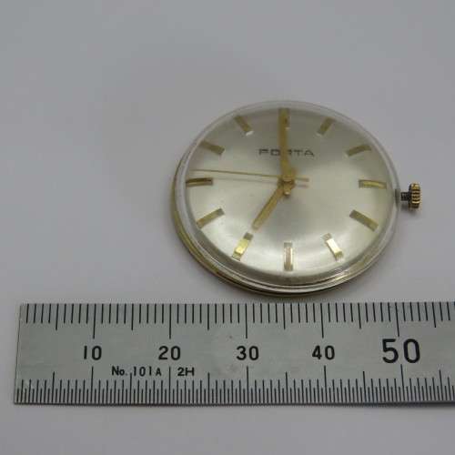 Vintage Porta mechanical watch movement with glass and case ring