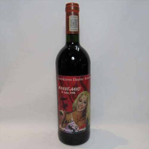 Korrektiewe Dienste Boksburg Manne-Aand wine bottle signed by Patricia Lewis