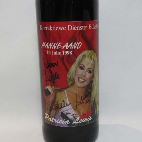 Korrektiewe Dienste Boksburg Manne-Aand wine bottle signed by Patricia Lewis