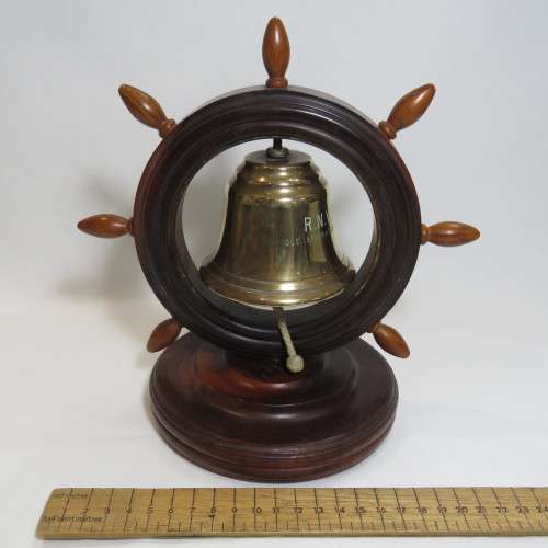 Royal Navy Reserves brass bell in ship's wheel on heavy wood stand (Walnut?)