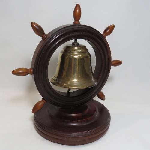 Royal Navy Reserves brass bell in ship's wheel on heavy wood stand (Walnut?)