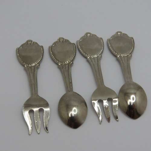 Pair of miniature London spoon and fork souvenir sets